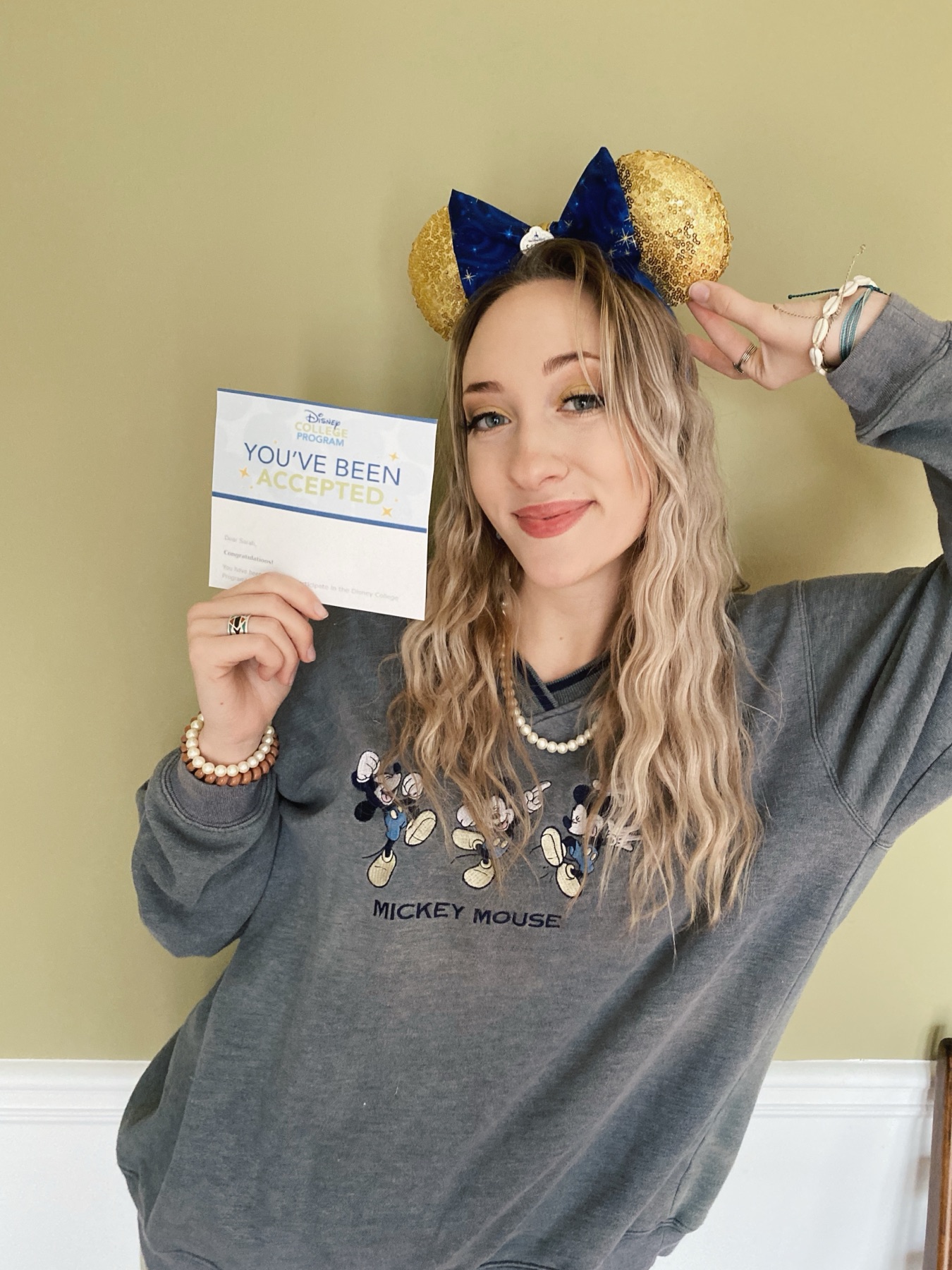 Magic Maker. Gold sequin ears, blue bow, custom name tag.